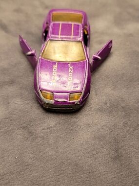 Vintage 1989 X200 Purple Hot Wheels Toy Sports Car with Opening Doors Kids Fun